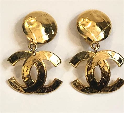 chanel dangling earrings gold|authentic Chanel logo stud earrings.